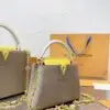 Louis Vuitton Capucines Handbag