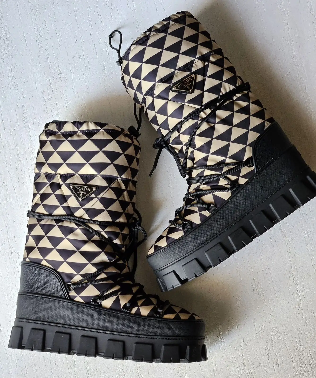 PRADA Triangle Logo Padded Leather Ankle Boots PRADA Triangle Logo Padded Leather Ankle Boots